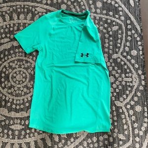 Green Under Armour shirt.